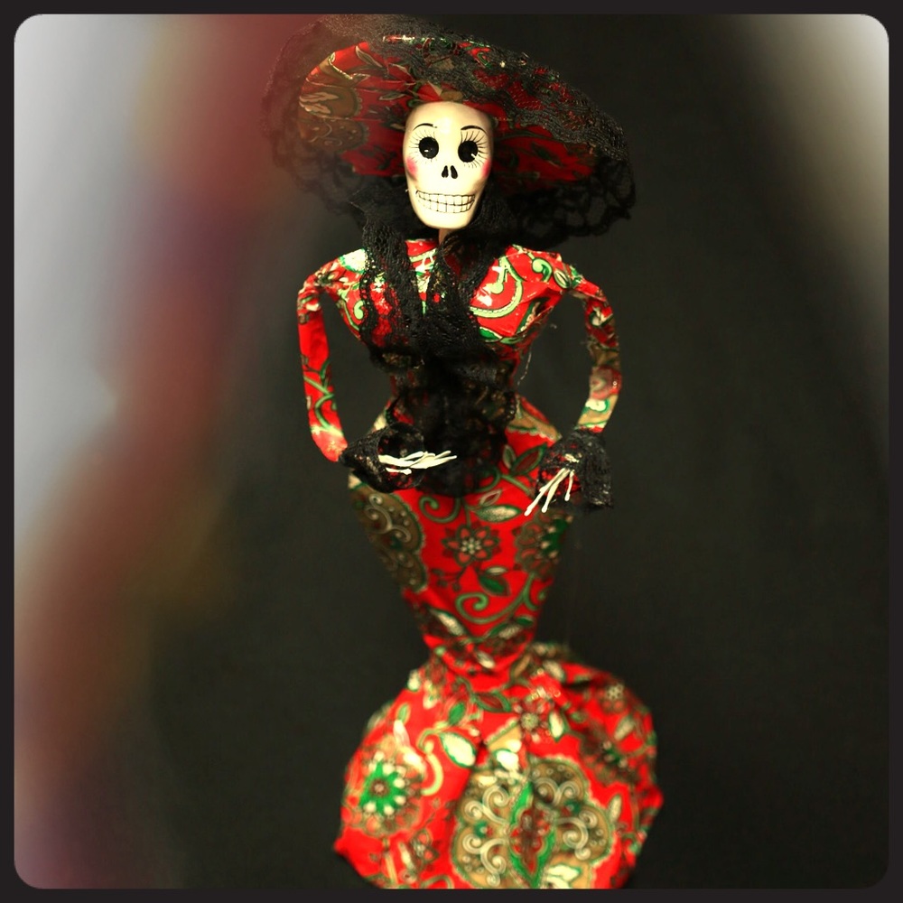Paper mache katrina doll